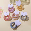 Set di 2 elastici per capelli con perline