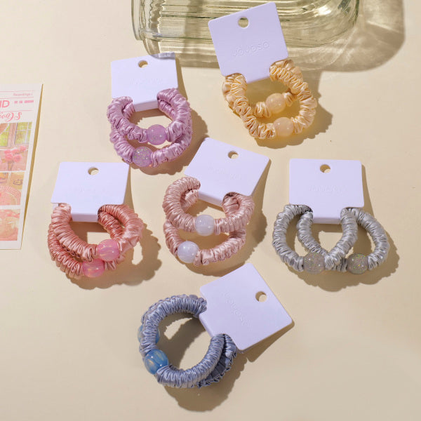 Set di 2 elastici per capelli con perline