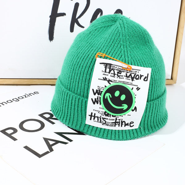Cappello lavorato a maglia con clip a forma di faccina sorridente - verde