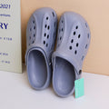 Crocs uomo ovali semplici in tinta unita, traforate, grigie, taglia 42