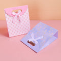 Borsa a tracolla con fiore piccolo cremoso M