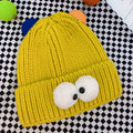 Cappello lavorato a maglia per bambini con simpatici occhi da cartone animato color caramella - zenzero